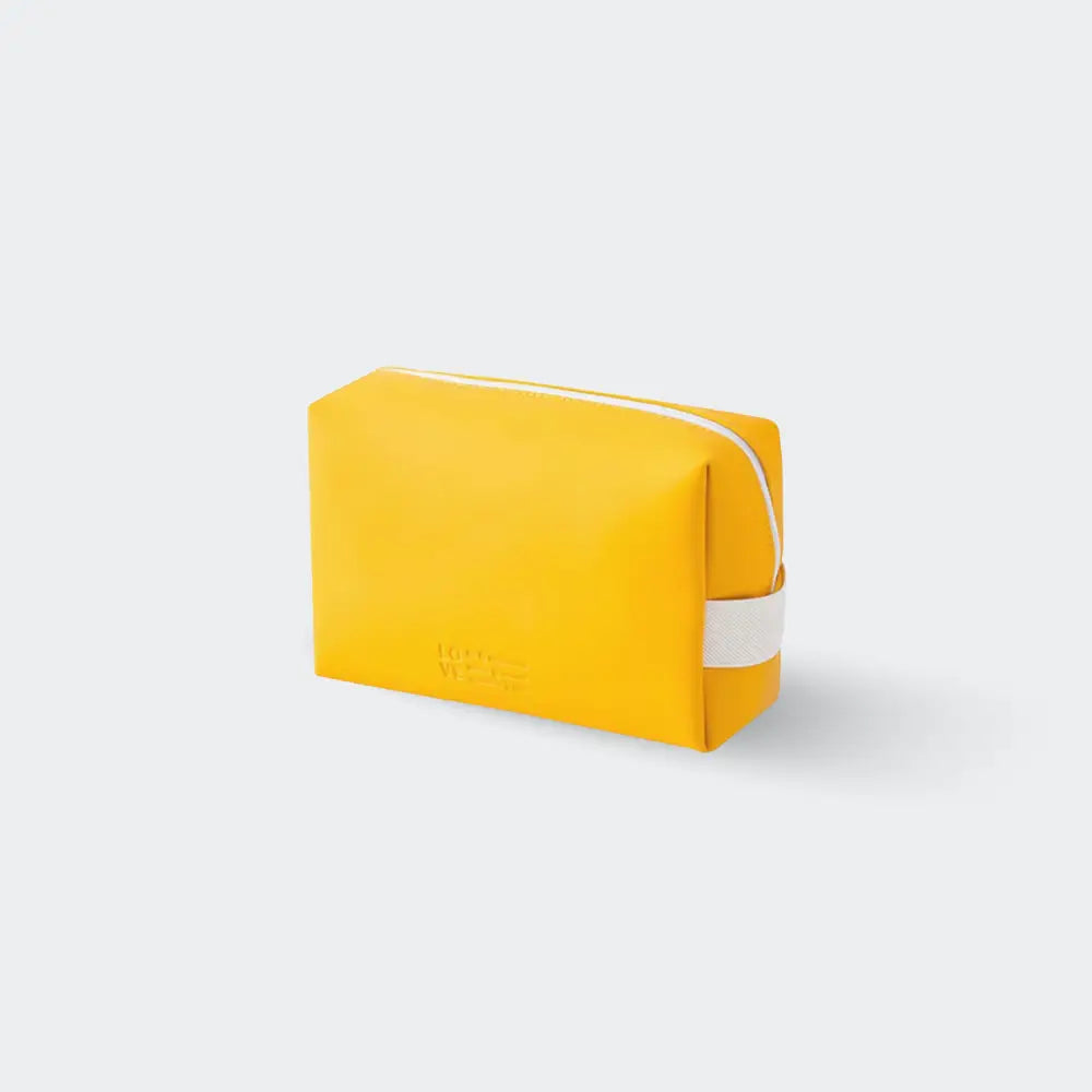 trousse de toilette luxe femme orange fond blanc